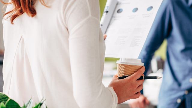 Woman examining financial planning IRA portfolio