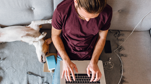Man with his dog on the couch