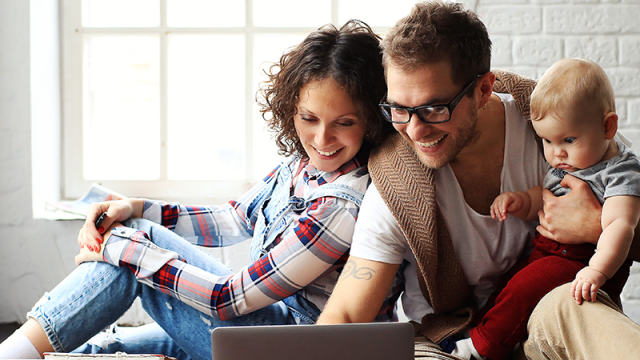 family searching for a house online